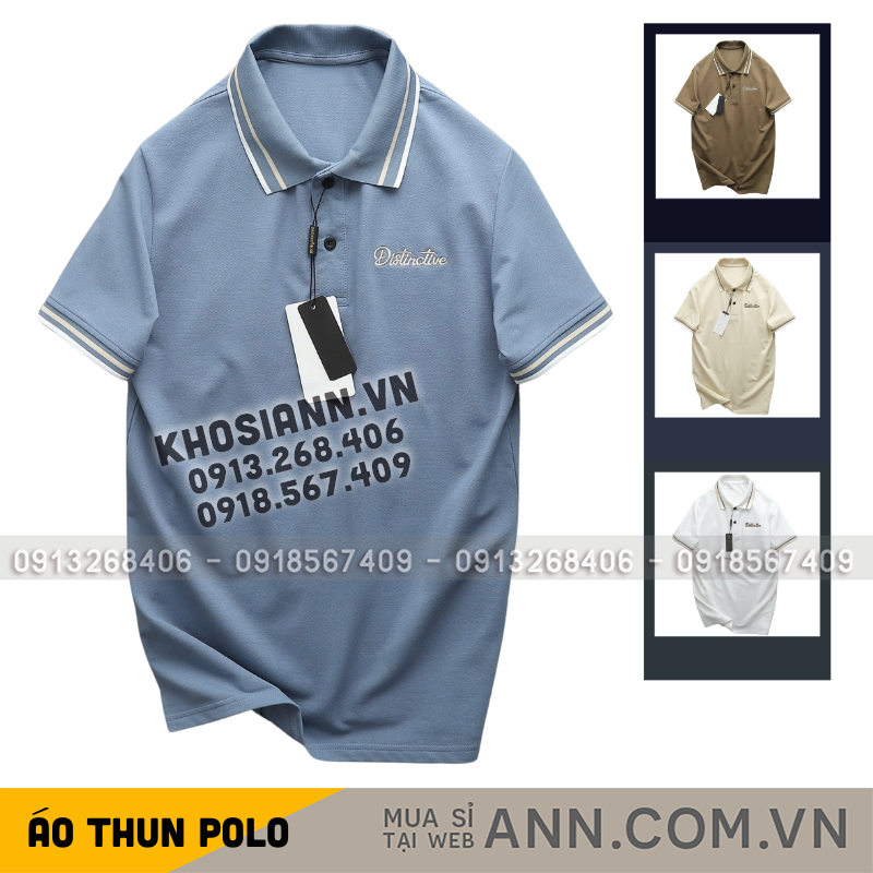 Cận cảnh mẫu áo xanh với cổ và tay phối sọc, ngực thêu logo