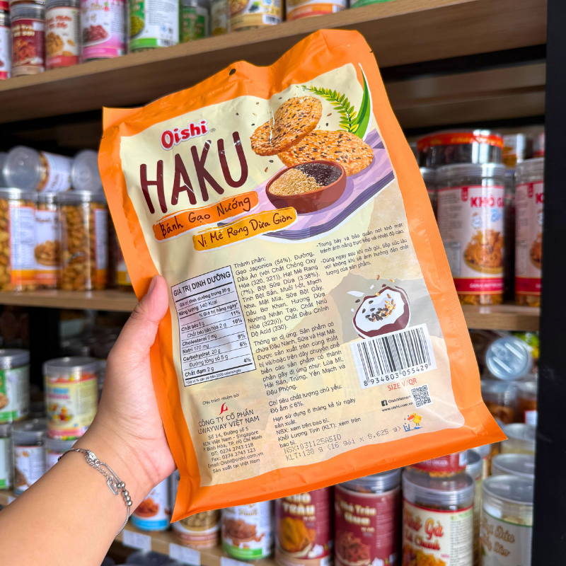 Mặt sau bao bì hiển thị thông tin thành phần, khối lượng và mã vạch