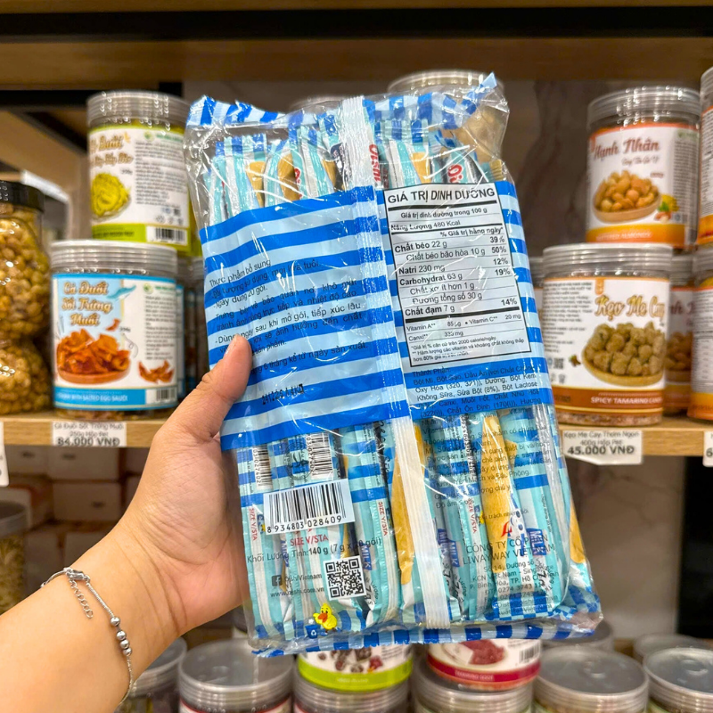Mặt sau bao bì với thông tin hướng dẫn và bảng giá trị dinh dưỡng