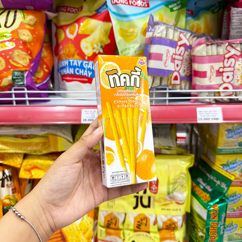 Bánh Que Đũa Phủ Yogurt Cam Ticky Uni Firms Màu Cam