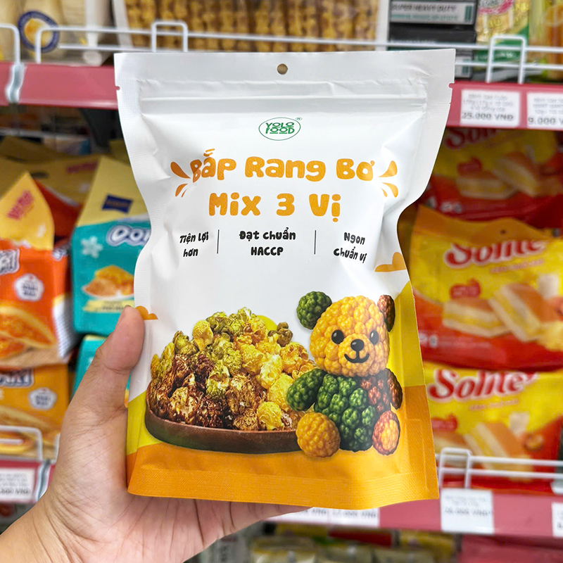Mặt trước bao bì với tên sản phẩm và hình minh họa 3 vị