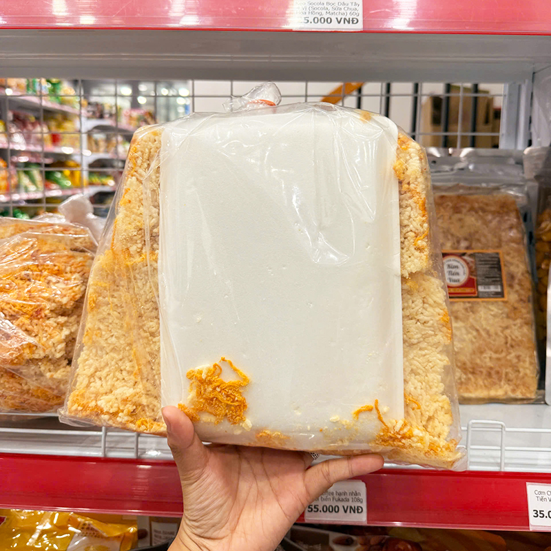 Mặt sau bịch sản phẩm với phần cơm cháy bên trong