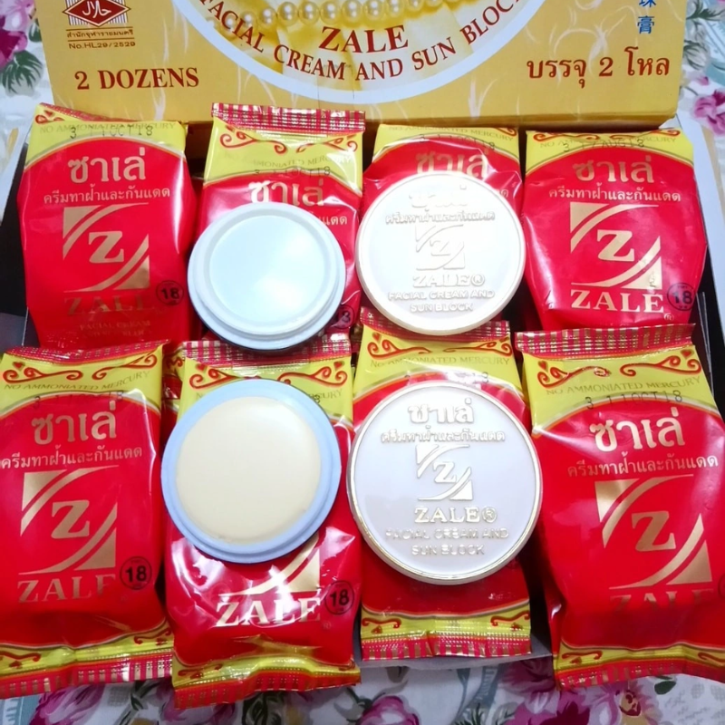 Bao bì Zale màu đỏ vàng và kem dạng hộp tròn