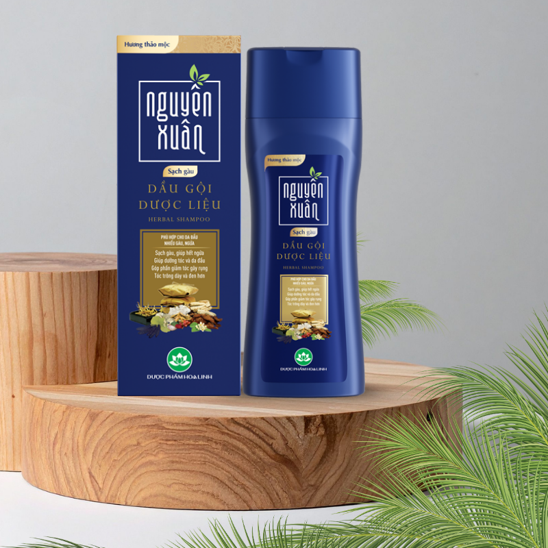 Hình ảnh chai và hộp sản phẩm màu xanh dương