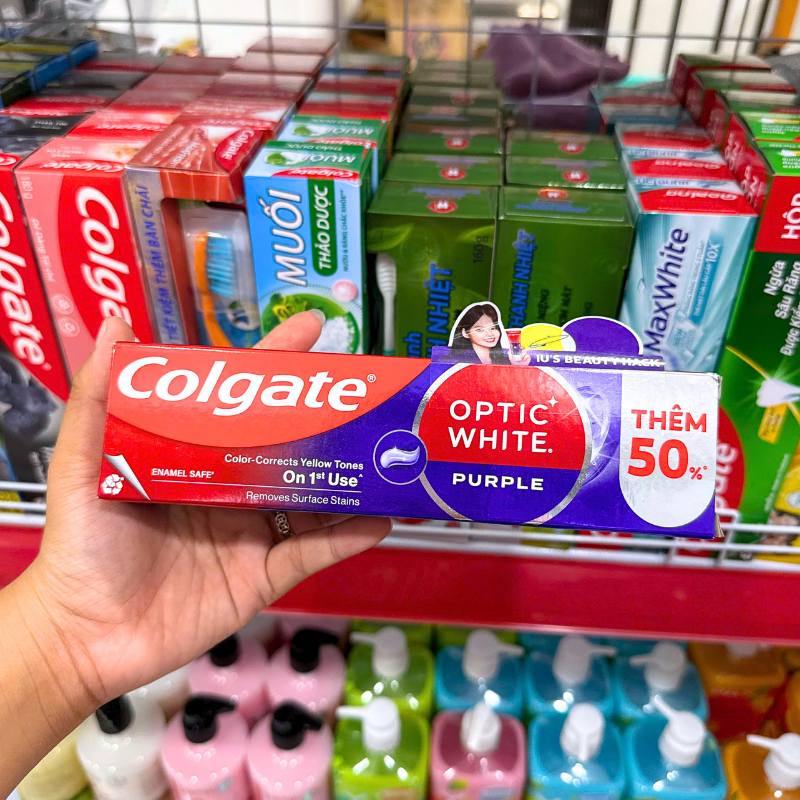 Mặt trước hộp với tên dòng Optic White Purple và quy cách thêm 50%