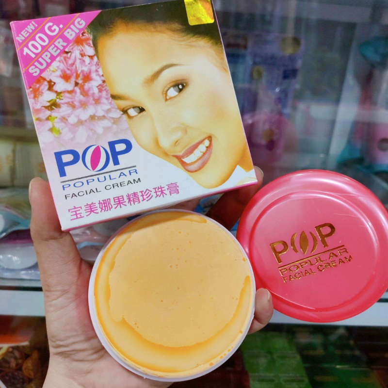 Hộp sản phẩm và hũ kem POP trong hình chụp cận