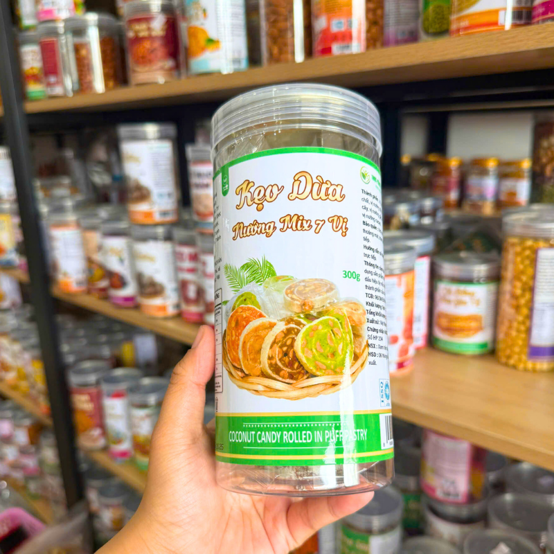 Kẹo Dừa Nướng Cuộn Bánh Tráng Mix 7 Vị 300g Hộp Pet