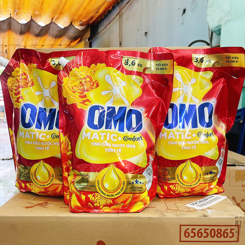 Nước Giặt OMO Matic Cửa Trên Hương Tinh Dầu Nước Hoa Tinh Tế 3.6kg