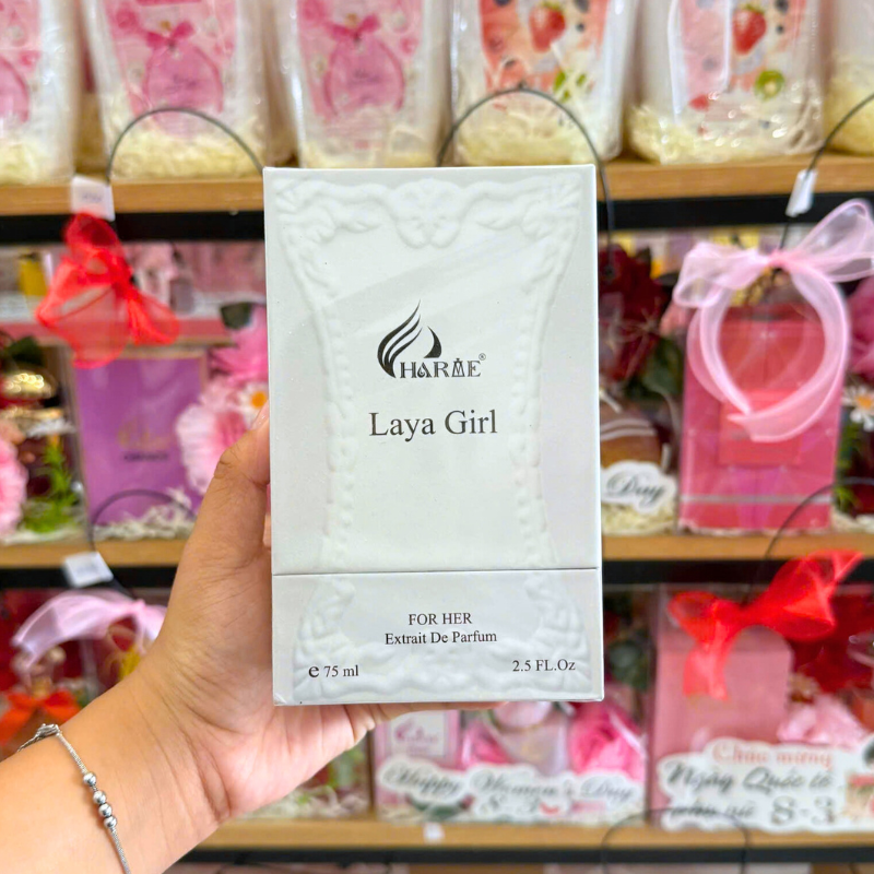 Chai sản phẩm cầm tay và bao bì mặt trước