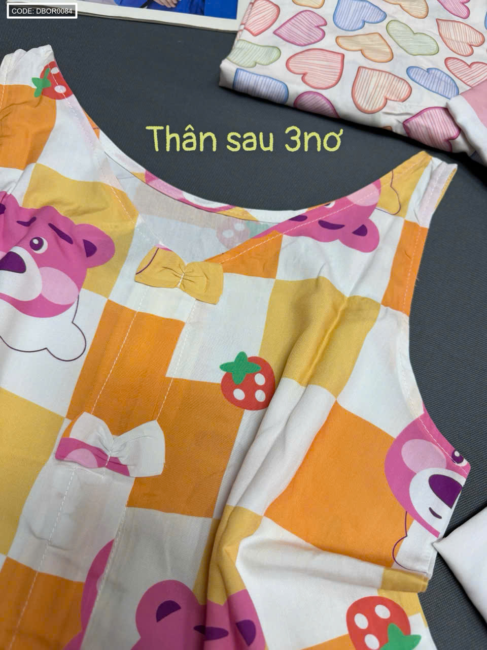 Đồ bộ sát nách 3 nơ sau quần lững tole xk lưng