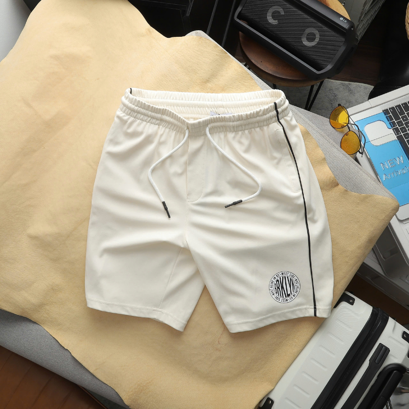 Quần short nam lưng thun phối sọc hai bên in logo có big size