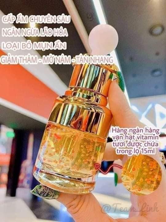 Kết cấu serum có các hạt vitamin trong chai