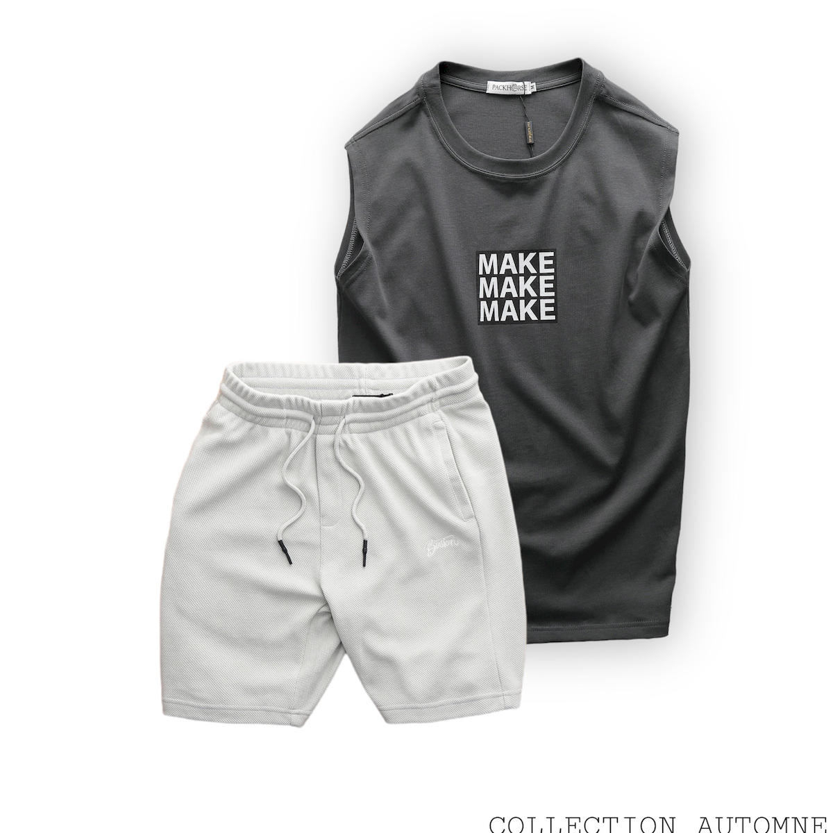 Phối áo xám với quần short sáng màu theo phong cách tối giản