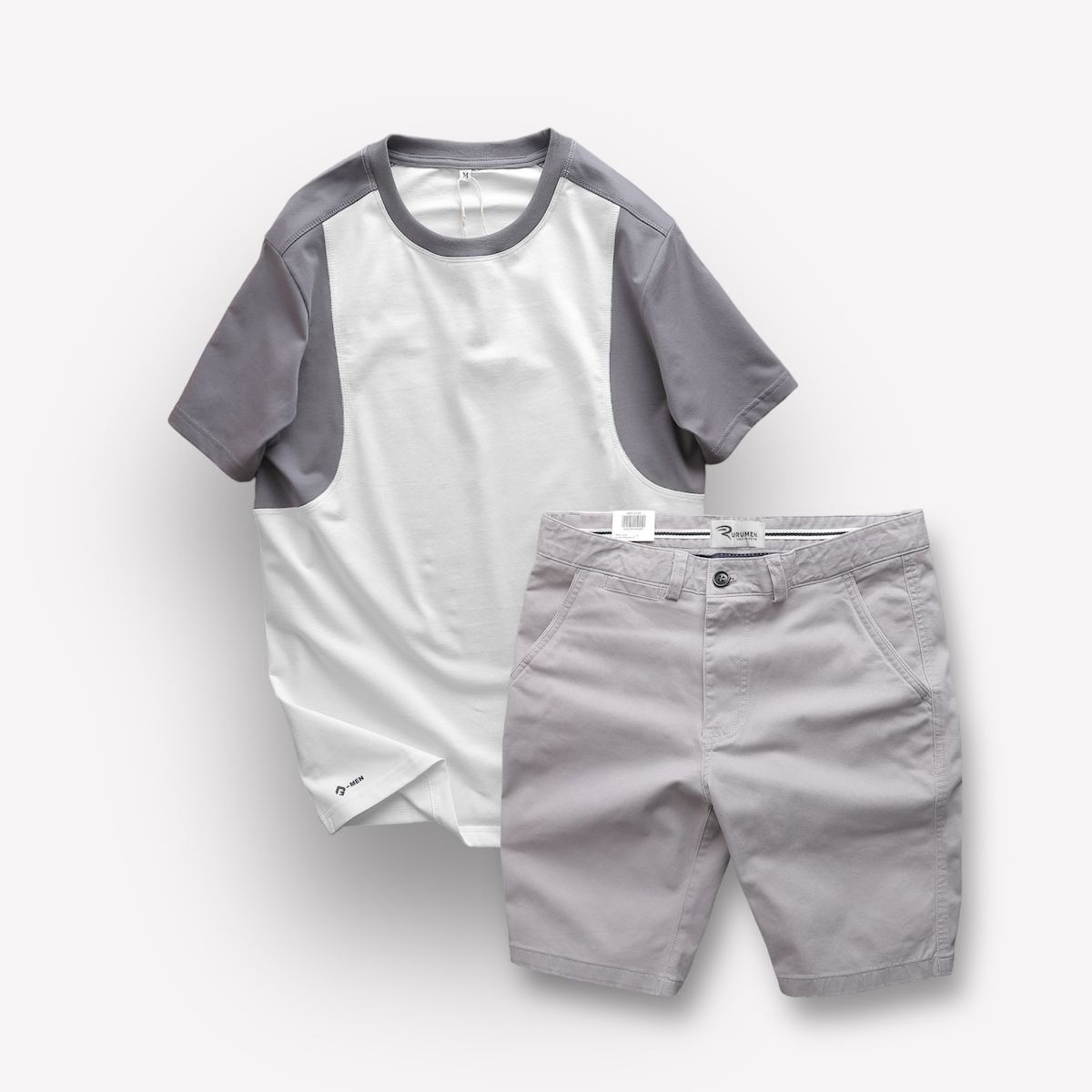 Phối màu áo trắng tay xám đi cùng quần short màu sáng