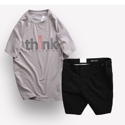 Phối áo xám in chữ với quần short màu đen