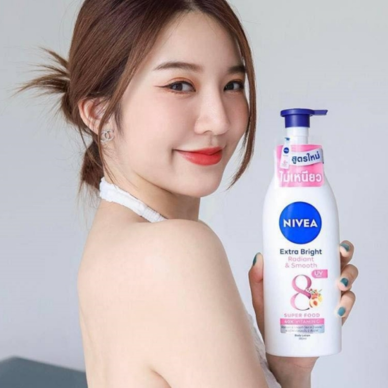 Sữa Dưỡng Thể Nivea Extra Bright Radiant & Smooth Ban Ngày 350ml Màu Hồng