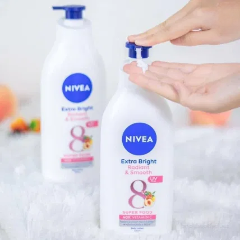 Sữa Dưỡng Thể Nivea Extra Bright Radiant & Smooth Ban Ngày 350ml Màu Hồng