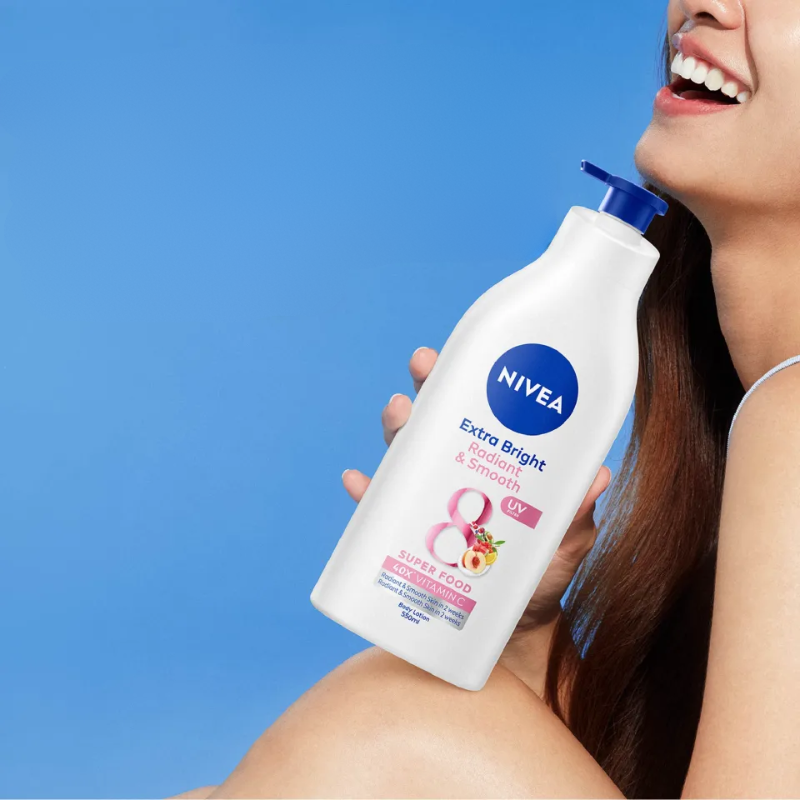 Sữa Dưỡng Thể Nivea Extra Bright Radiant & Smooth Ban Ngày 350ml Màu Hồng