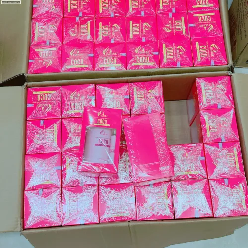 Nhiều hộp màu hồng COCO xếp trong thùng, nhận diện dòng sản phẩm rõ ràng