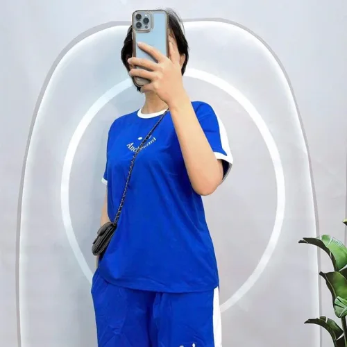 Đồ bộ quần đùi áo tay ngắn cổ tròn in hình mặt cười