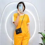 Đồ bộ quần đùi áo tay ngắn cổ tròn in hình mặt cười