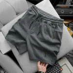 Quần Short Thun Nam Viền Sọc Thêu Logo Chữ