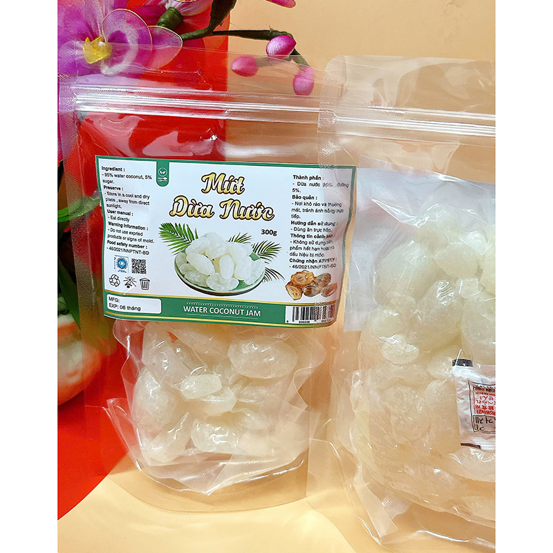 23385_z6125806461374-7e65ba618d7975c58684ac51fe6573be_20241214111449-5.jpg Mứt Dừa Nước Túi Zip 300g - MDNHCK