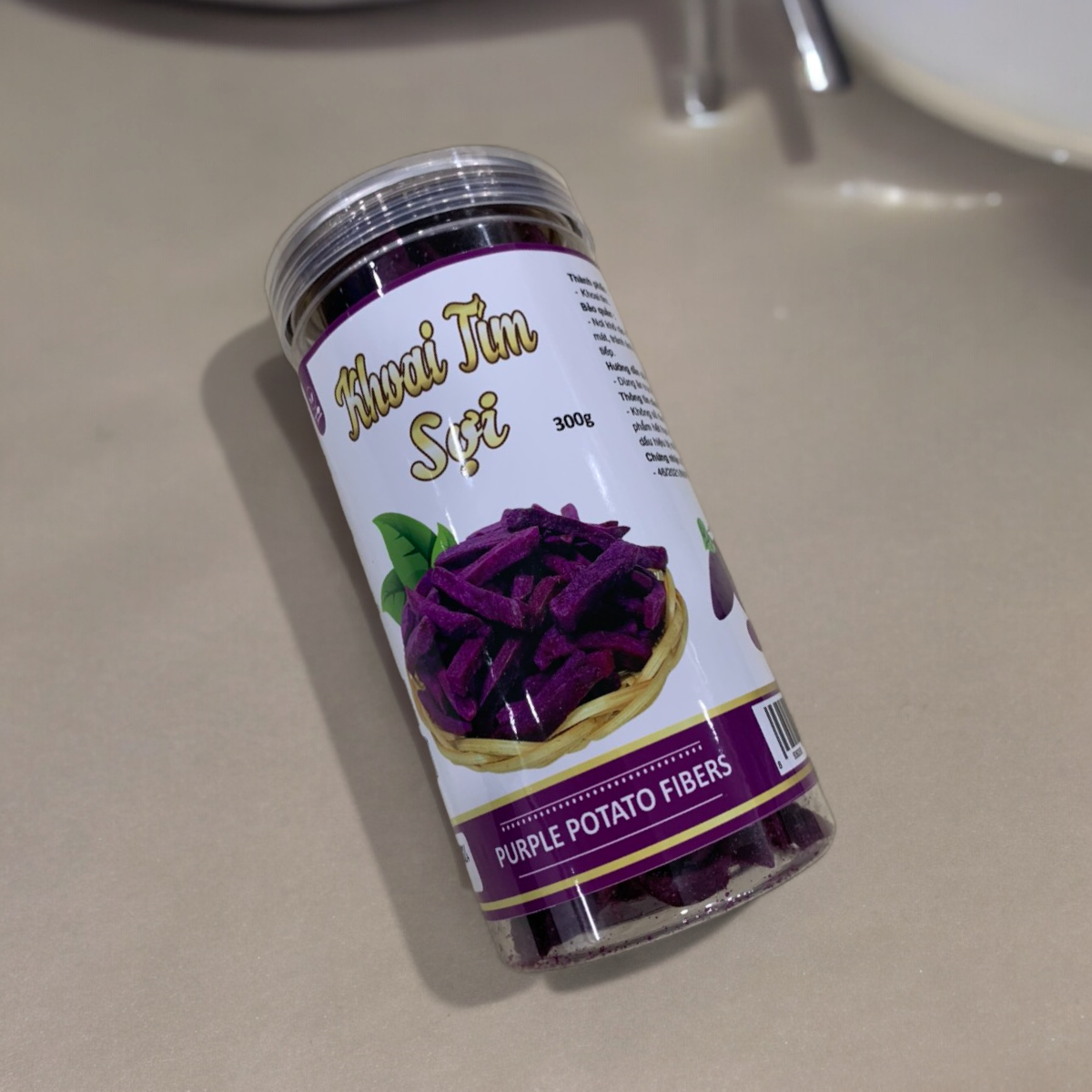 24447_z5494823765720-1c3c3612b98c916d035f6e0f3c6bb6c3-photoroom_20240601141726-7.png Khoai Lang Tím Sợi Cộng Giòn 300g - 8936208930912