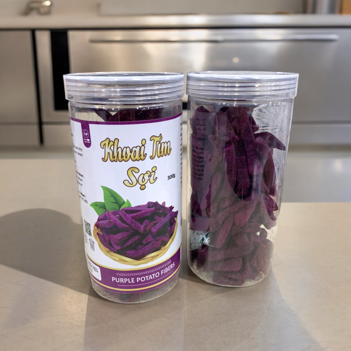 24447_z5494823835182-7fc04648971eca2e895f988f679d2564-photoroom_20240601141727-7.png Khoai Lang Tím Sợi Cộng Giòn 300g - 8936208930912