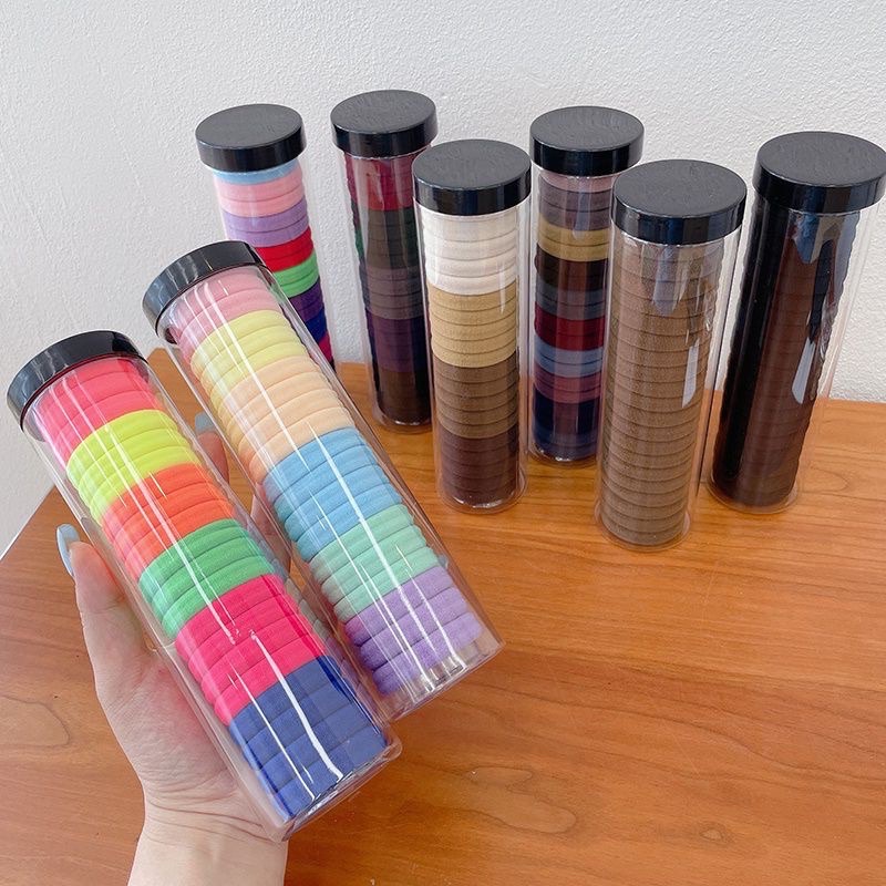 24563_3704d47c596598f688c10e6b21983b12_20240617144930-2.jpg Combo 3 Dây Thun Cột Tóc Co Giãn Mềm Mại - Hộp 20 Dây Thun Buộc Tóc Trơn - Giao Ngẫu Nhiên Hộp 19.5cm - CBCOTTOC01