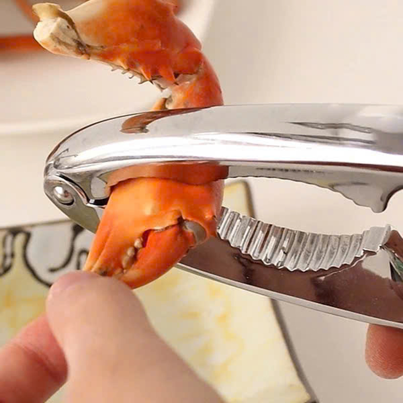 25981_z6230728720706-72335767e8460356f5349ad3481f83fd_20250117165241-2.jpg Dụng Cụ Kẹp Càng Cua Ghẹ Và Tách Các Loại Vỏ Hạt Cứng -Kìm Kẹp Càng Cua Inox Siêu Bền Cao Cấp 15x3.6cm - DCKCC01