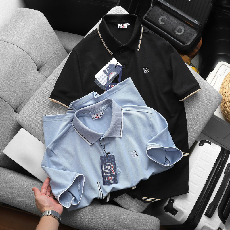 Bỏ sỉ áo Thun Nam Polo - Áo Thun Cổ Bẻ Nam Thêu Logo Chữ R Trước Ngực Và Phối Sọc Ở Vạt Áo Sang Trọng Có Big Size Bỏ sỉ áo Thun Nam Polo - Áo Thun Cổ Bẻ Nam Thêu Logo Chữ R Trước Ngực Và Phối Sọc Ở Vạt Áo Sang Trọng Có Big Size